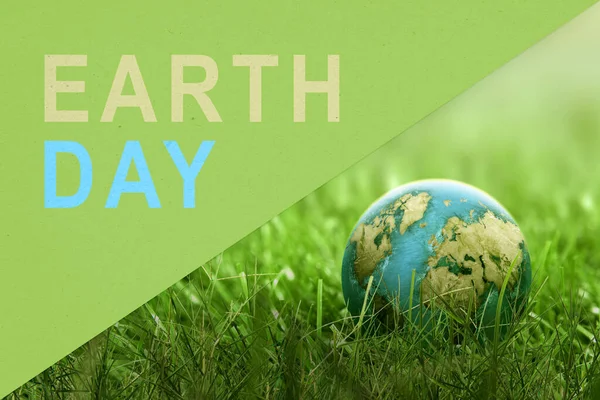 Earth on the ground. Earth Day Concept