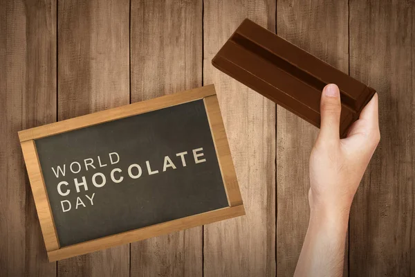 Main Humaine Tenant Barre Chocolat Concept Journée Mondiale Chocolat — Photo