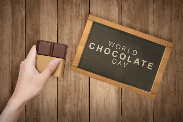Main Humaine Tenant Barre Chocolat Concept Journée Mondiale Chocolat — Photo