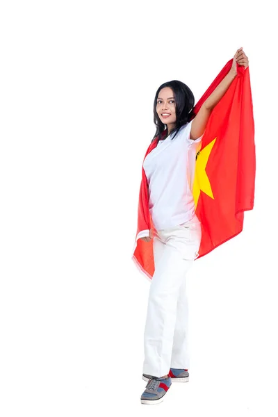 아시아 여성들은 일하얀 베트남 국기를 시킴으로써 베트남 독립일을 — 스톡 사진