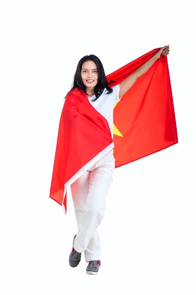 아시아 여성들은 일하얀 베트남 국기를 시킴으로써 베트남 독립일을 — 스톡 사진