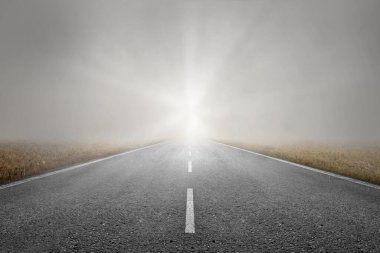 Asphalt road with dramatic sky background