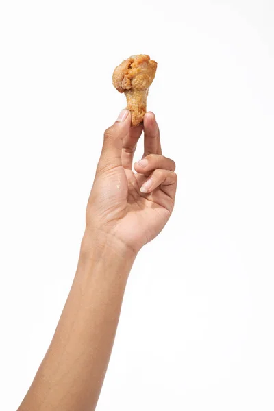 Mänsklig Hand Håller Grillad Kyckling Vinge Med Vit Bakgrund — Stockfoto