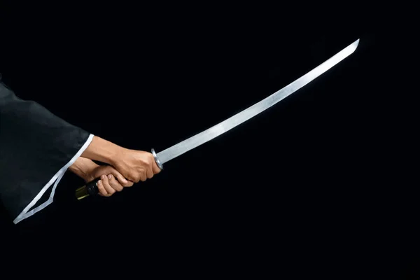 A Samurai warrior holding a sword with a black background