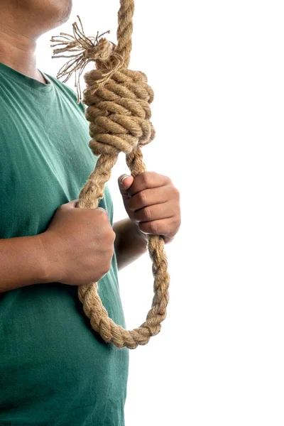 İpe asılmış bir adam beyaz arka planda izole edilmiş bir iple asılmış.