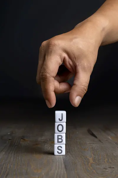 Human Hand Puts Stack Small Cubes Jobs Letter Job Vacancy — Stock Photo, Image