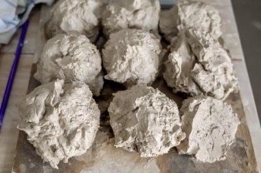 Set of wet clay material for making a clay pot. Craft clay concept