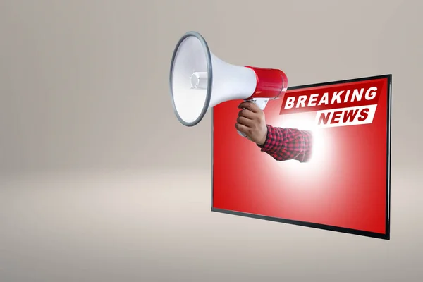 A human hand holding a megaphone comes out from the big television screen with a breaking news inscription on a colored background. Live broadcasting, news, and journalism concept