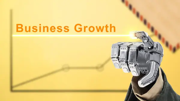 Robotic hand showing business growth text on a colored background. Business growth concept