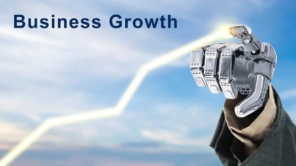 Robotic hand showing an increasing graph with business growth text. Business growth concept