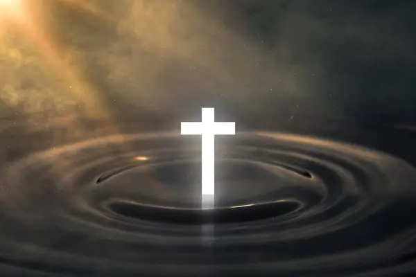 Religious cross of Jesus Christ on a water surface with sunbeam liaght in the dark background. Resurrection, christian, pray, easter concept.