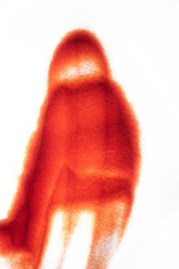 Beyaz arkaplandaki kırmızı parıltının yakın görüntüsü