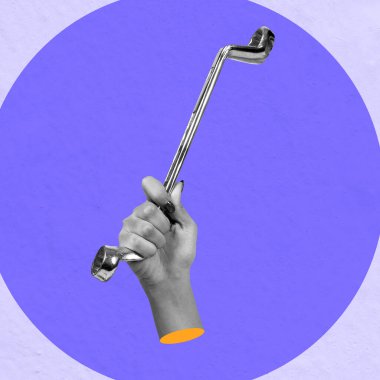 Renkli bir arka planda İngiliz anahtarı tutan bir insan eli. Kolaj sanatı