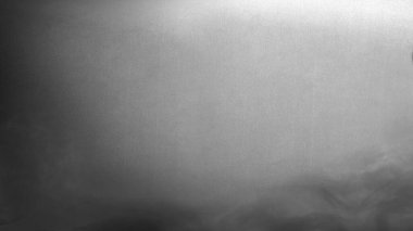 Gri ve beyaz arkaplanda çizgiler var. Arka plan bulanık ve çizgiler çok ince. Sahne karanlık ve gizemli. Modelleme. Uzayı kopyala Duvar kağıdı veya Cadılar Bayramı arkaplanı