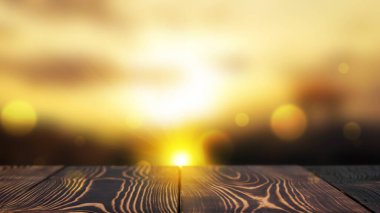 Boş ahşap masa üstü, arka planda gün batımının bulanık ışıkları var. Ürün sunumunu düzenle. Uzayı kopyala Bulanık arkaplan
