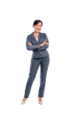 Beyaz bir arka planda kendine güvenen Asyalı bir iş kadınının portresi. İş kavramı, girişimci ve başarılı.