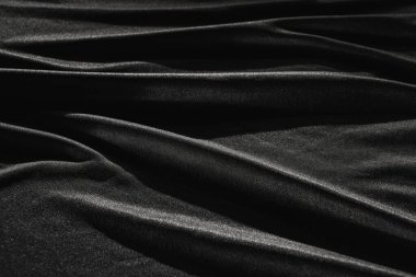 Buruşuk desenli siyah saten ipekten. Malzeme tekstil yüzeyi. Boşluğu kopyala