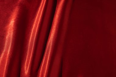 Buruşuk desenli kırmızı saten ipekten. Malzeme tekstil yüzeyi. Boşluğu kopyala