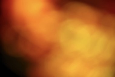 Bulanık ışık bokeh daireleri içeren renkli soyut bir arkaplan koyu veya siyah bir arkaplan. Bokeh ışıkları renkli, canlı gölgelerde neşeli ve büyülü bir atmosfer yaratıyor.