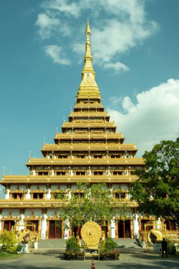 Khon Kaen, Thailand, Jan 13, 2023 : Phra Mahathat Kaen Nakhon (Wat Nong Wang ), Pagoda-style Buddhist temple featuring 9 receding levels topped with a soaring golden spire.