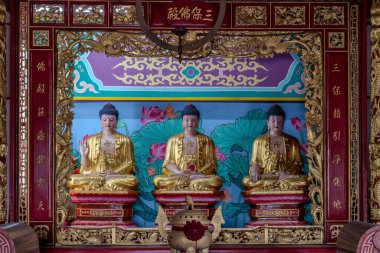 Thailand, August 11, 2024, Guan Yu Shrine (Khlong San), Buddha statues in a beautifully decorated temple with intricate designs and serene atmosphere surrounded by vibrant colors clipart