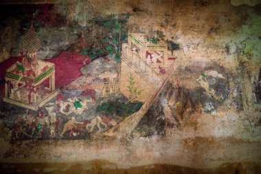 Mart ayında Wat Chomphuwek, Nonthaburi 'de tarihi sahneleri canlı renklerle ve karmaşık tasarımlarla vurgulayan geleneksel Tayland sanatının detaylı bir duvar resmi sergilenmektedir..