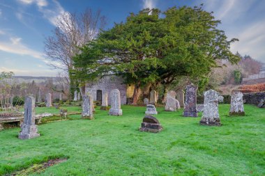 The old graveyard at Inverkip houses the now roofless mausoleum of the Shaw-Stewarts from nearby Ardgowan Estate. Inverkip village was a hotbed for a large number of witchcraft accusations, almost all of those targeted were women.