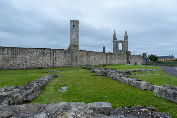 stock image St Andrews, Scotland, UK - July 13, 2024: The ancient ruins and towers including St Rule's Tower of the towns Roman Catholic cathedral