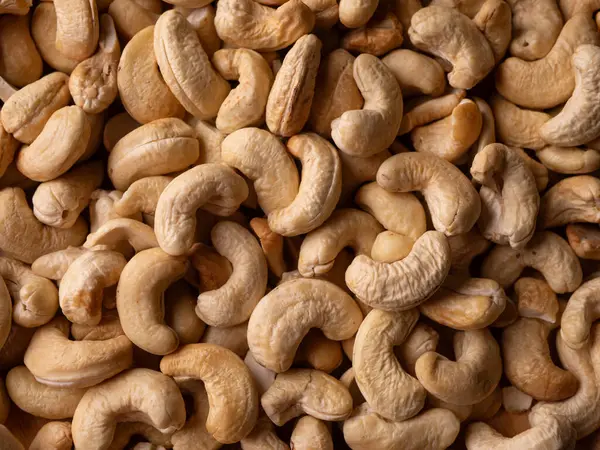 Tam kare fındık arka planı. Vejetaryen Organik Sağlıklı Atıştırma Konsepti.