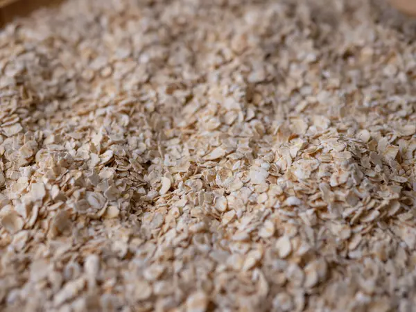 organik yulaf ezmesi veya yulaf ezmesi desenli arkaplan.