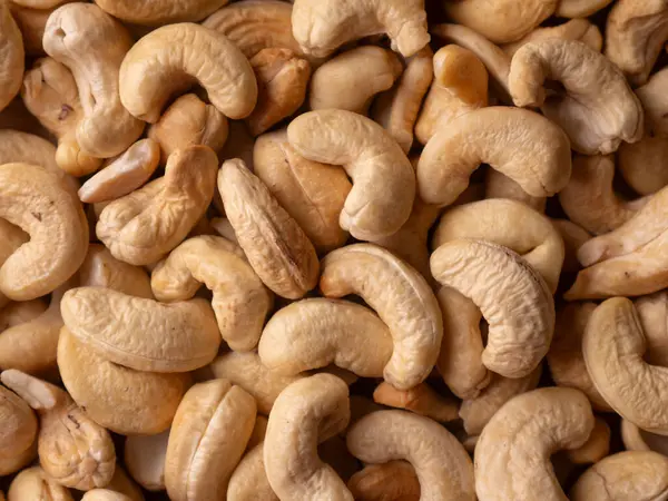 Tam kare fındık arka planı. Vejetaryen Organik Sağlıklı Atıştırma Konsepti.