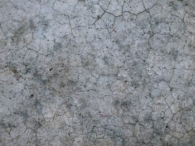 Çatlamış çimento yüzey dokusu doğal kusurlarla dolu..