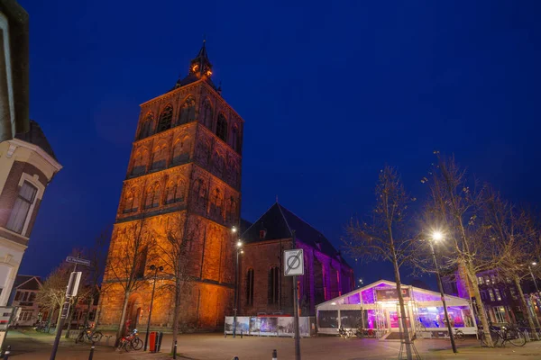 stock image OLDENZAAL, NETHERLANDS - NOVEMBER 26, 2022: St-Plechelmus basilica exterior at night. It is one of the 23 basilicas in the netherlands