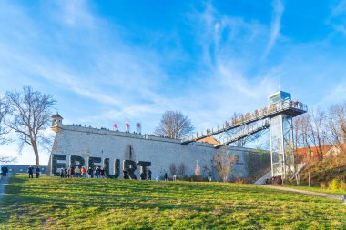 ERFURT, GERMANY - NOVEMBER 30, 2024: Citadel of Petersberg, one of the largest and best-preserved town fortresses in Europe. The citadel was built on Petersberg hill, in the north-western part of the old town centre from 1665, when Erfurt was governe clipart