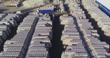 Warehouse of finished products near the factory. Large outdoor warehouse. Large warehouse near the factory.
