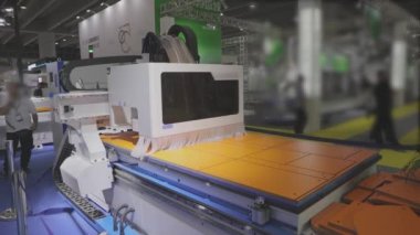 Work CNC machine at a major international exhibition. Cnc machine.