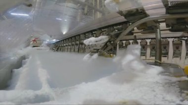 Freezing ice cream at the factory. Automatic production of ice cream. Ice cream production at the factory.