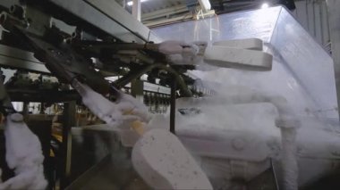 Freezing ice cream on the conveyor. Ice cream production process. Conveyor at the ice cream factory.