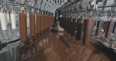 Freezing ice cream at the factory. Automatic production of ice cream. Ice cream production at the factory.