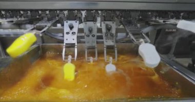 How ice cream is made. The process of making ice cream. Automated ice cream factory.