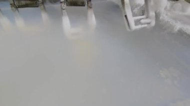 Freezing ice cream at the factory. Automatic production of ice cream. Ice cream production at the factory.