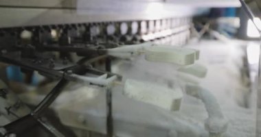 Freezing ice cream at the factory. Automatic production of ice cream. Ice cream production at the factory.