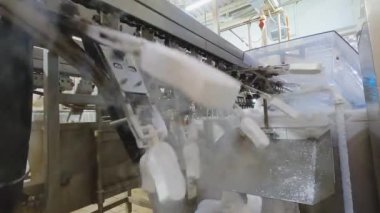 Freezing ice cream on the conveyor. Ice cream production process. Conveyor at the ice cream factory.