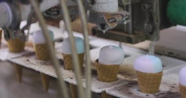 How ice cream is made. The process of making ice cream. Automated ice cream factory.