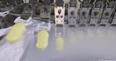 Freezing ice cream at the factory. Automatic production of ice cream. Ice cream production at the factory.