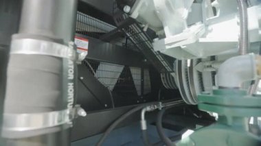 Industrial diesel generator inside. Diesel generator set. Modern industrial diesel generator inside.
