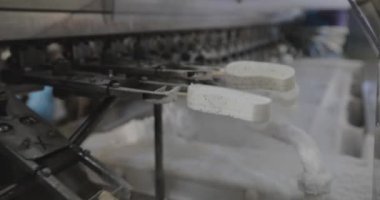Freezing ice cream at the factory. Automatic production of ice cream. Ice cream production at the factory.
