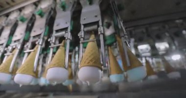 How ice cream is made. The process of making ice cream. Automated ice cream factory.