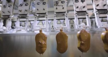 Freezing ice cream at the factory. Automatic production of ice cream. Ice cream production at the factory.