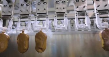 Freezing ice cream at the factory. Automatic production of ice cream. Ice cream production at the factory.